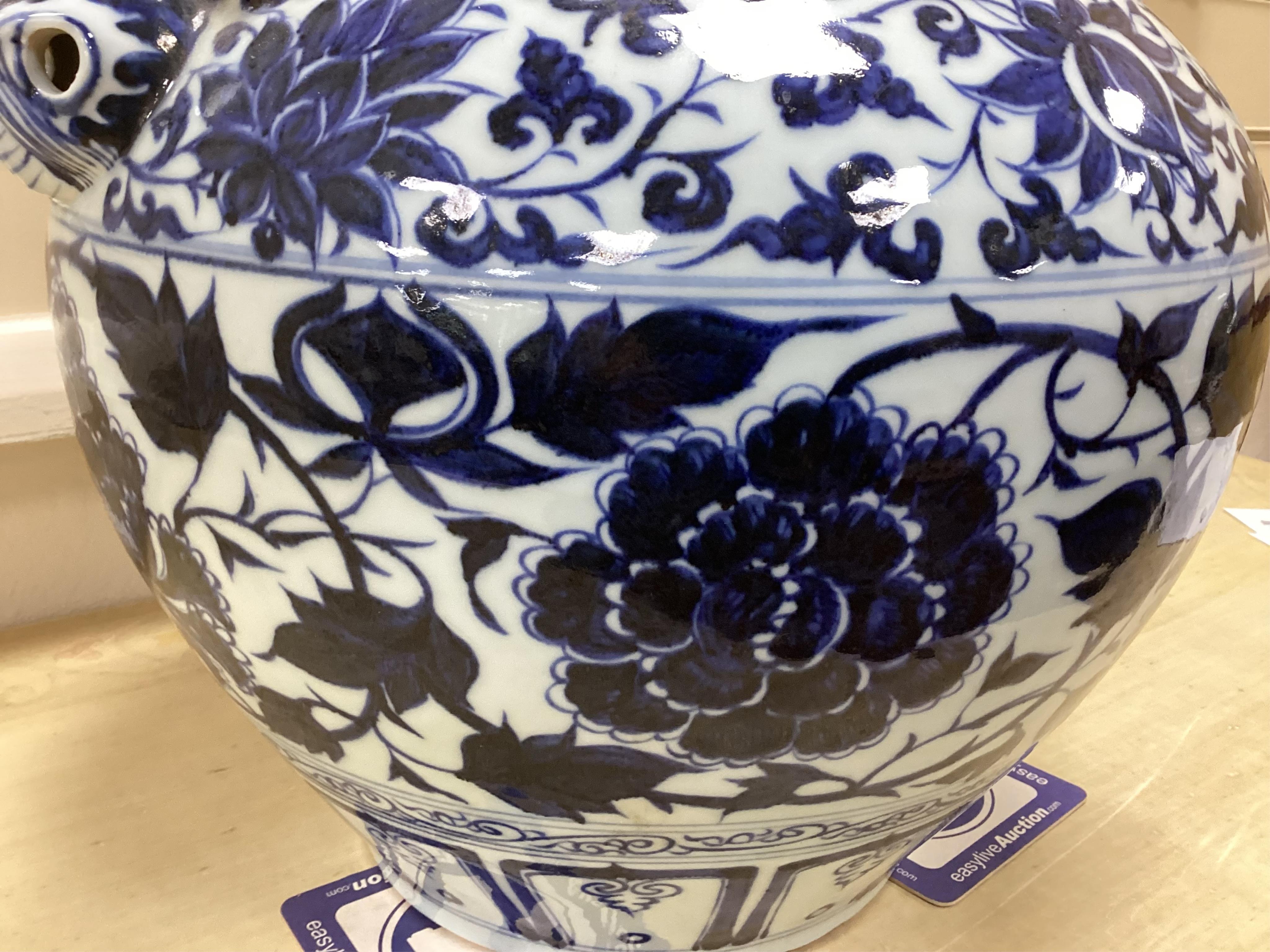 A Chinese blue and white pot vase with zoological handles, 38cm high